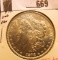 1878 P Morgan Silver Dollar, 7 tail feathers, 2nd reverse, Brilliant Uncirculated.