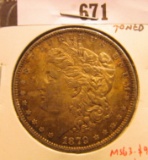 1879 P Morgan Silver Dollar, Brilliant Uncirculated, toned.