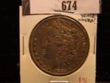 1882 O Morgan Silver Dollar, Almost Uncirculated, toned.