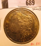 1921 P Morgan Silver Dollar, Almost Uncirculated, toned.