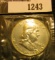 1243.           1962 P U.S. Proof Franklin Half Dollar in original U.S. Mint Cellophane.