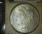 1844.           1900 P Morgan Silver Dollar, Choice AU.