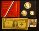 1446.           1776-1976 S U.S. Three-Piece Proof Set in original red and blue holder, no box; & Se