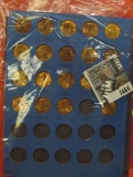 1664.           1975-83 Partial Set of BU Lincoln Cents in a blue Whitman folder.