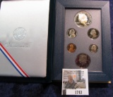 1743.           1990 S U.S. Eisenhower Commemorative Coins Silver Prestige Proof Set, original as is