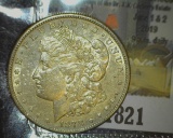 1821.           1878 S Morgan Silver Dollar, EF.