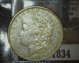 1834.           1892 P Morgan Silver Dollar, EF.