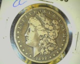 1835.           1892 CC Morgan Silver Dollar, Fine.