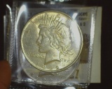1927.           1922 P & 23 P Peace Silver Dollar, AU-Unc.