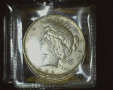 1928.           1922 P & 23 P Peace Silver Dollar, AU-Unc.