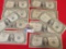 Group of ten old One Dollar U.S. Silver Certificates dating back as far as 1935.