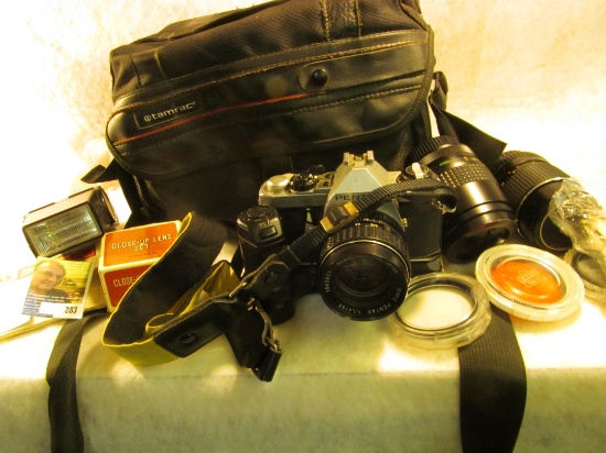 "ME Super Pentax" 35mm Camera; multiple lenses, Flash, and etc. in a carry case.