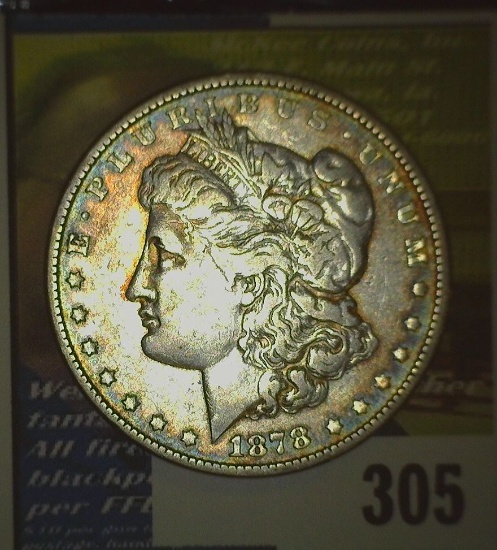1878 P 7 tail feathers, reverse of 79 Morgan Silver Dollar.