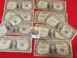 Group of ten old One Dollar U.S. Silver Certificates dating back as far as 1935.