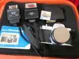 (3) different style Camera Flashes; Minolta Hi-matic Manual; & 