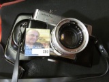 Minolta Easy Flash 35mm camera with original leather camera case and strap.