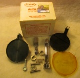 Lee Auto Primer with a pair of shell holders in original box.