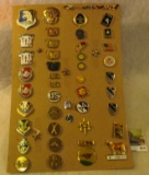 Nice group of mostly Military Pinbacks and cufflinks. Approximately 50 pcs.