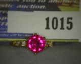 Size 7 Ladies Red Ruby? and Diamond? 14K Gold Ring. According to note with ring, 