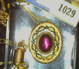 Antique Broach Pendant with Necklace, appears to have an Amethyst set.