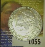 John Paul II Medal. Depicts his portrait and the Vatican.