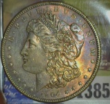 1904 P Morgan Dollar, Rainbow Toned Uncirculated.