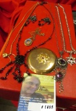 Group of old Jewelry including Earrings, Necklaces, and a Watch case back.
