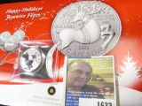 2012 Argent Silver Twenty Dollar Canadian Coin with A Reindeer on the front