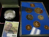 2010 Isle Of Man 1 Crown Coin with Queen Elizabeth on one side & Buckingham Palace on the reverse.
