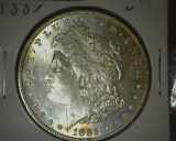 1885 P Brilliant Uncirculated Silver Dollar with very attractive toning.