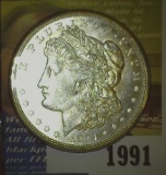 1921 D Brilliant Uncirculated Morgan Silver Dollar.