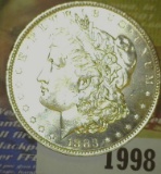 1883 O Brilliant Uncirculated Morgan Silver Dollar.