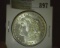 1921 P Brilliant Uncirculated Morgan Silver Dollar.