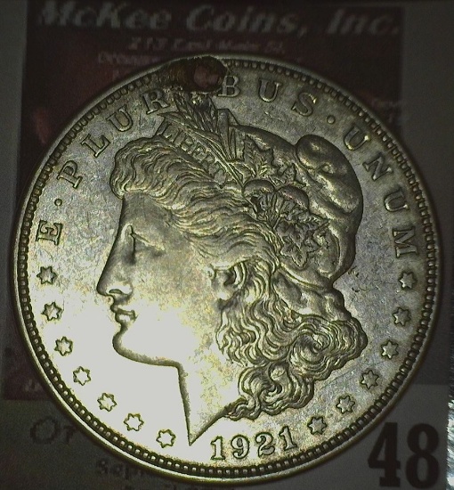 1921 D Morgan Silver Dollar, holed and ready to place on your necklace.