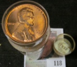 Steve, you have been whining for one of these, here you go: 1957 P BU Roll of Lincoln Cents in a pla