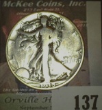 1938 D Key-date Walking Liberty Half Dollar.