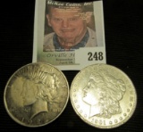 1901 O & 1927 D P U.S. Silver Dollars.