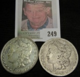 1882 O & 1902 O Morgan Silver Dollars.