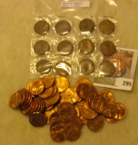 Pack of (12) 1909-30 Lincoln cents & a pack of (50) 1974 D Brilliant Uncirculated Lincoln Cents.