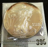 1997 U.S. .999 Fine Silver American Eagle Dollar Coin, nice toned BU.