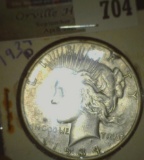 1934 D U.S. Silver Peace Dollar.