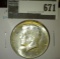 1965 Kennedy Half Dollar, BU, value $10