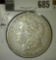 1878 Morgan Dollar, 7 tail feathers, 3rd reverse, VF+ value $45