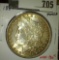 1884-O Morgan Dollar, BU toned, value MS64 $80, MS65 $165