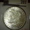 1885 Morgan Dollar, BU, value MS63 $65, MS65 $165