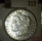 1889 Morgan Dollar, BU, value MS63 $65, MS64 $80, MS65 $165