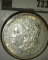 1890-S Morgan Dollar, AU with luster, value $45