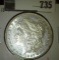 1897 Morgan Dollar, BU, value $85