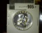 1957 Proof 90% Silver Franklin Half Dollar, value $28