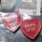 Two leather hearts with 